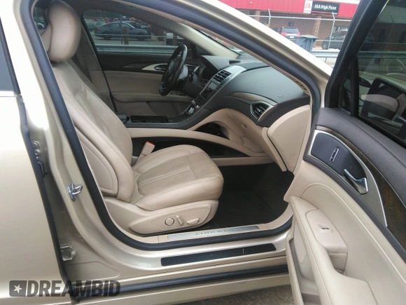 2017 Lincoln MKZ Reserve z VIN 3LN6L5E94HR615115, wystawiony jako IAAI lot #41947698 z przebiegiem 122 090 mil mil oraz . Historia ofert i sprzedaży dostępna na DreamBid. Obrazek 5.