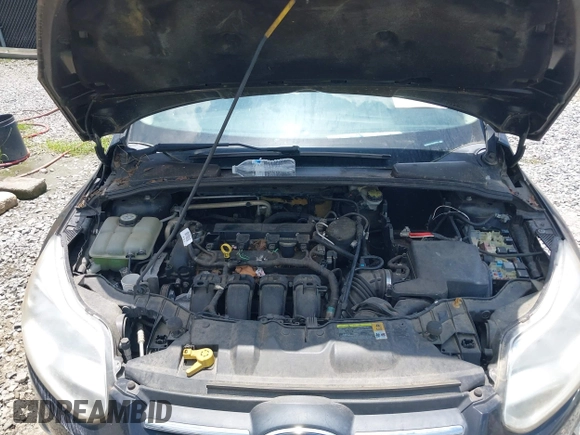 2012 Ford Focus SE with VIN 1FAHP3F21CL390012, listed as a IAAI auction lot 42634521 with 214,617 mi miles and . Bid and sale history available at DreamBid. Image 10.