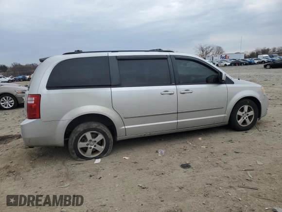 2010 Dodge Grand Caravan SXT with VIN 2D4RN5D14AR118765, listed as a Copart auction lot 50819035 with 162,041 mi miles and Salvage Title. Bid and sale history available at DreamBid. Image 3.