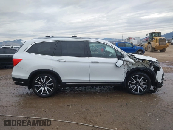 2021 Honda Pilot Elite with VIN 5FNYF6H03MB044154, listed as a IAAI auction lot 41050202 with 60,331 mi miles and . Bid and sale history available at DreamBid. Image 13.