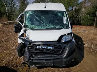 2023 Ram ProMaster Cargo with VIN 3C6MRVJG0PE514388, listed as a Copart auction lot 50252345 with Not Provided miles and Salvage Title. Bid and sale history available at DreamBid. Image 5.