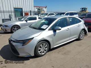 2021 Toyota Corolla LE with VIN 5YFEPMAE2MP166647, listed as a IAAI auction lot 41670097 with 143,557 mi miles. Bid and sale history available at carsss.com. Image 2.