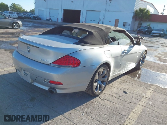 2006 BMW 6 Series 650Ci z VIN WBAEK13446CN77929, wystawiony jako IAAI lot #41853425 z przebiegiem 133 515 mil mil oraz . Historia ofert i sprzedaży dostępna na DreamBid. Obrazek 4.