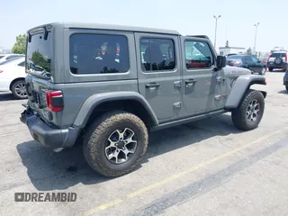 2020 Jeep Wrangler Unlimited Rubicon with VIN 1C4HJXFG3LW279636, listed as a IAAI auction lot 42430354 with 19,631 mi miles and . Bid and sale history available at DreamBid. Image 4.