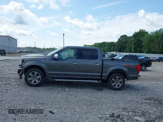 2018 Ford F-150 XL with VIN 1FTEW1E50JFD58356, listed as a IAAI auction lot 42456741 with 153,332 mi miles and . Bid and sale history available at DreamBid. Image 15.