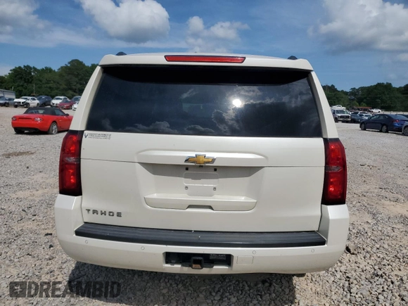 2015 Chevrolet Tahoe LT z VIN 1GNSCBKC5FR638002, wystawiony jako Copart lot #54857225 z przebiegiem 142 165 mil mil oraz Szkoda całkowita • Salvage title. Historia ofert i sprzedaży dostępna na DreamBid. Obrazek 6.
