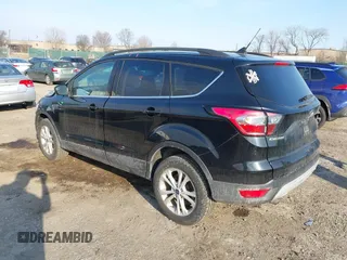 2018 Ford Escape SE z VIN 1FMCU9GD9JUC25456, wystawiony jako IAAI lot #41721436 z przebiegiem 55 642 mil mil oraz . Historia ofert i sprzedaży dostępna na DreamBid. Obrazek 3.