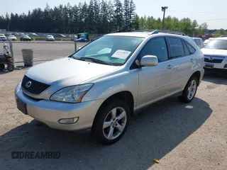 2007 Lexus RX 350 with VIN 2T2HK31U37C028032, listed as a IAAI auction lot 42117631 with 142,430 mi miles. Bid and sale history available at carsss.com. Image 2.