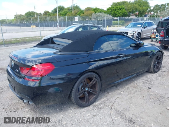 2014 BMW M6 with VIN WBSLZ9C52EDZ78748, listed as a IAAI auction lot 42152435 with 57,150 mi miles and . Bid and sale history available at DreamBid. Image 4.