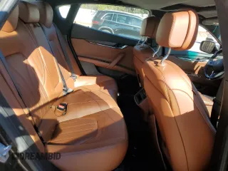 2016 Maserati Quattroporte S Q4 z VIN ZAM56RRA9G1185301, wystawiony jako Copart lot #83337804 z przebiegiem 102 195 mil mil oraz Szkoda całkowita • Salvage title. Historia ofert i sprzedaży dostępna na DreamBid. Obrazek 10.