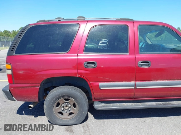 2004 Chevrolet Tahoe LS with VIN 1GNEC13Z74R207698, listed as a IAAI auction lot 42310462 with 255,218 mi miles and . Bid and sale history available at DreamBid. Image 13.