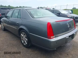 2006 Cadillac DTS 1SC z VIN 1G6KD57Y76U244707, wystawiony jako IAAI lot #42445115 z przebiegiem 189 119 mil mil oraz . Historia ofert i sprzedaży dostępna na DreamBid. Obrazek 3.