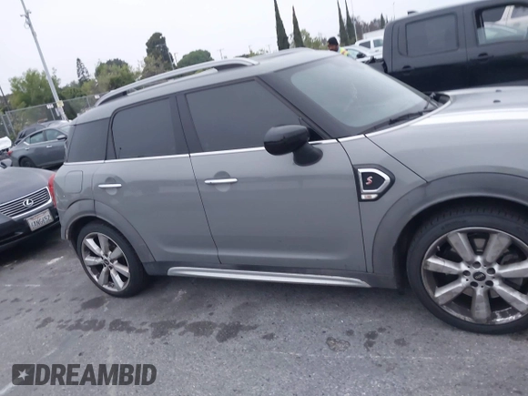 2020 MINI Countryman Cooper S with VIN WMZYW7C00L3L92535, listed as a IAAI auction lot 42029989 with 61,066 mi miles and . Bid and sale history available at DreamBid. Image 13.