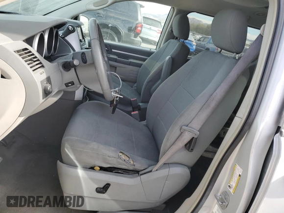 2009 Dodge Grand Caravan SXT z VIN 2D8HN54159R620187, wystawiony jako Copart lot #84703224 z przebiegiem 206 240 mil mil oraz Szkoda całkowita • Salvage title. Historia ofert i sprzedaży dostępna na DreamBid. Obrazek 7.