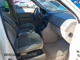 2004 Kia Sedona LX with VIN KNDUP131046577380, listed as a IAAI auction lot 41468710 with 138,451 mi miles and . Bid and sale history available at DreamBid. Image 5.