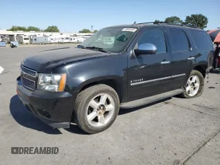 2009 Chevrolet Tahoe LTZ with VIN 1GNFK33089R139455, listed as a Copart auction lot 58953995 with 176,029 mi miles and Salvage title. Bid and sale history available at DreamBid. Image 1.