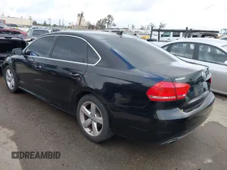 2012 Volkswagen Passat SE with VIN 1VWBP7A31CC047883, listed as a IAAI auction lot 42130138 with 142,017 mi miles. Bid and sale history available at carsss.com. Image 3.