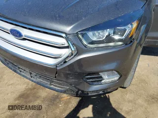 2017 Ford Escape SE with VIN 1FMCU9G94HUE80554, listed as a IAAI auction lot 42039491 with 57,145 mi miles. Bid and sale history available at carsss.com. Image 6.