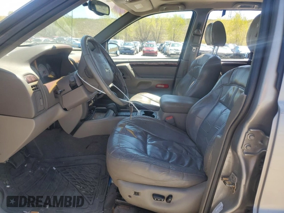 2001 Jeep Grand Cherokee Limited with VIN 1J4GW58N11C568908, listed as a Copart auction lot 55697175 with 214,491 mi miles and Clean Title. Bid and sale history available at DreamBid. Image 7.
