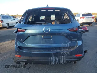 2023 Mazda CX-5 2.5 S with VIN JM3KFBAM5P0228761, listed as a Copart auction lot 42827995 with 0 mi miles and Salvage Title. Bid and sale history available at carsss.com. Image 6.