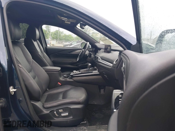 2021 Mazda CX-9 Carbon Edition z VIN JM3TCBDY7M0536005, wystawiony jako IAAI lot #42424129 z przebiegiem 48 005 mil mil oraz . Historia ofert i sprzedaży dostępna na DreamBid. Obrazek 5.