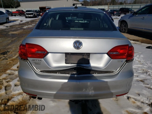 2012 Volkswagen Jetta TDI w/Premium with VIN 3VWLL7AJXCM038466, listed as a Copart auction lot 87885425 with 264,882 mi miles and Salvage title. Bid and sale history available at DreamBid. Image 6.