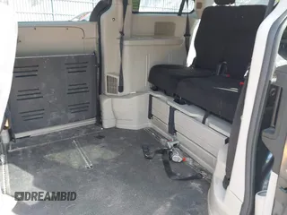 2013 Dodge Grand Caravan SXT with VIN 2C4RDGCG4DR636798, listed as a IAAI auction lot 42240550 with 96,100 mi miles and . Bid and sale history available at DreamBid. Image 8.