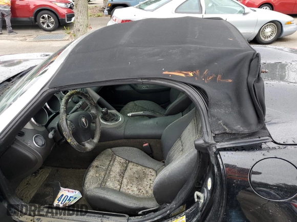 2006 Pontiac Solstice z VIN 1G2MB33B56Y000343, wystawiony jako Copart lot #74567004 z przebiegiem Nie podano mil oraz Szkoda całkowita • Salvage title. Historia ofert i sprzedaży dostępna na DreamBid. Obrazek 12.