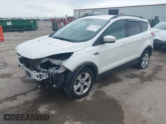 2014 Ford Escape SE with VIN 1FMCU9GX2EUA62133, listed as a IAAI auction lot 42342688 with Not provided miles and . Bid and sale history available at DreamBid. Image 2.