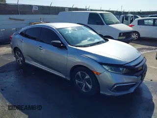 2020 Honda Civic Sedan LX with VIN 2HGFC2F6XLH533726, listed as a IAAI auction lot 41633882 with 141,835 mi miles. Bid and sale history available at carsss.com. Image 1.