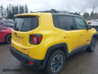 2015 Jeep Renegade Trailhawk with VIN ZACCJBCT8FPC21019, listed as a IAAI auction lot 41924514 with 144,172 mi miles. Bid and sale history available at carsss.com. Image 4.