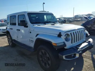 2018 Jeep Wrangler Unlimited Sahara with VIN 1C4HJXEG5JW214057, listed as a IAAI auction lot 41644504 with 87,214 mi miles. Bid and sale history available at carsss.com. Image 1.