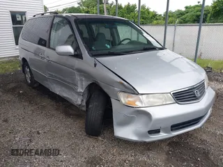 2001 Honda Odyssey EX z VIN 2HKRL18611H501206, wystawiony jako IAAI lot #42310549 z przebiegiem 172 917 mil mil oraz . Historia ofert i sprzedaży dostępna na DreamBid. Obrazek 1.