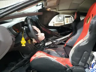 2000 Toyota Celica GT z VIN JTDDR32T4Y0040075, wystawiony jako Copart lot #81778264 z przebiegiem 237 802 mil mil oraz Szkody całkowita. Historia ofert i sprzedaży dostępna na DreamBid. Obrazek 7.