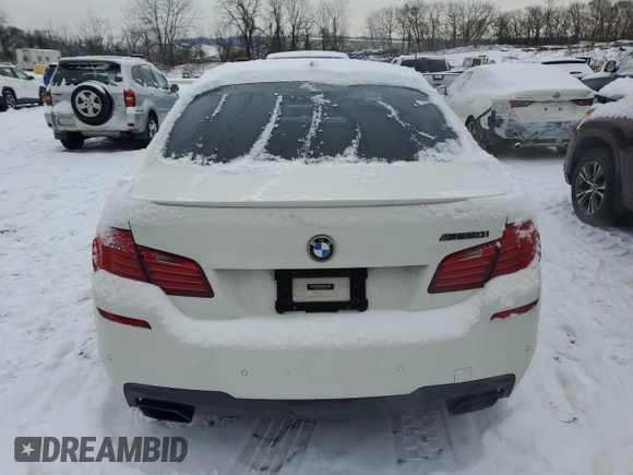 2015 BMW 5 Series 550i with VIN WBAKN9C55FD960970, listed as a Copart auction lot 84994434 with 105,593 mi miles and Salvage title. Bid and sale history available at DreamBid. Image 6.