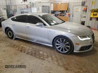 2012 Audi A7 Prestige z VIN WAUSGAFC6CN008572, wystawiony jako Copart lot #47227365 z przebiegiem 185 311 mil mil oraz Szkoda całkowita • Salvage title. Historia ofert i sprzedaży dostępna na DreamBid. Obrazek 4.