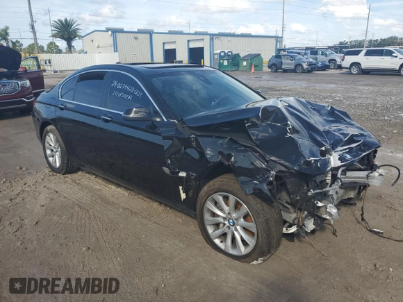 2014 BMW 7 Series 740i with VIN WBAYA6C54ED144416, listed as a Copart auction lot 74846184 with 0 mi miles and Salvage Title. Bid and sale history available at carsss.com. Image 4.