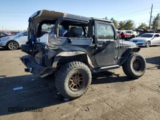 2009 Jeep Wrangler Rubicon with VIN 1J4GA64169L765933, listed as a Copart auction lot 84963104 with 107,190 mi miles and Salvage Title. Bid and sale history available at DreamBid. Image 3.