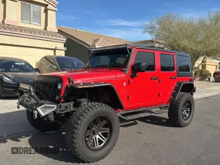 2018 Jeep Wrangler JK Unlimited Sport S with VIN 1C4BJWDG7JL828871, listed as a Copart auction lot 87530425 with 60,958 mi miles and Clean Title. Bid and sale history available at carsss.com. Image 2.