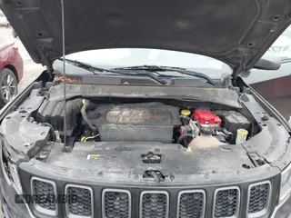 2019 Jeep Compass Trailhawk with VIN 3C4NJDDB1KT739938, listed as a IAAI auction lot 41411173 with 140,396 mi miles and . Bid and sale history available at carsss.com. Image 10.