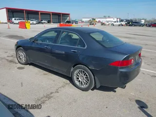 2004 Acura TSX w/Navigation with VIN JH4CL96974C017539, listed as a IAAI auction lot 41918507 with 168,557 mi miles. Bid and sale history available at carsss.com. Image 3.