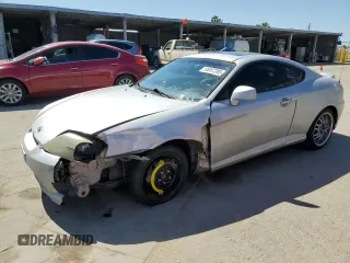 2006 Hyundai Tiburon GT z VIN KMHHN65F26U225506, wystawiony jako Copart lot #56997285 z przebiegiem 170 175 mil mil oraz Szkody całkowita. Historia ofert i sprzedaży dostępna na DreamBid. Obrazek 1.