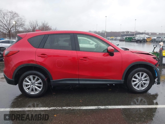 2015 Mazda CX-5 Touring with VIN JM3KE4CY3F0529669, listed as a IAAI auction lot 41866873 with 137,635 mi miles and . Bid and sale history available at carsss.com. Image 13.