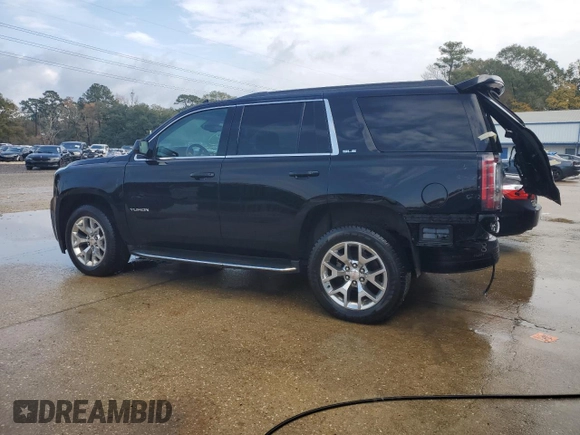 2017 GMC Yukon SLE with VIN 1GKS1AKC3HR307466, listed as a Copart auction lot 77559704 with 130,274 mi miles and Salvage Title. Bid and sale history available at carsss.com. Image 2.