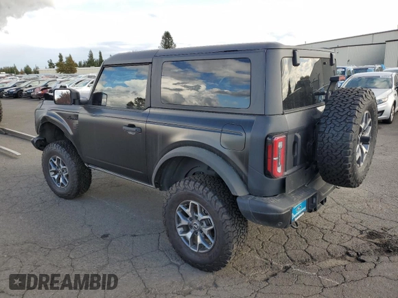 2023 Ford Bronco with VIN 1FMDE5CP1PLA92944, listed as a Copart auction lot 66625304 with 115,179 mi miles and Salvage title. Bid and sale history available at DreamBid. Image 2.