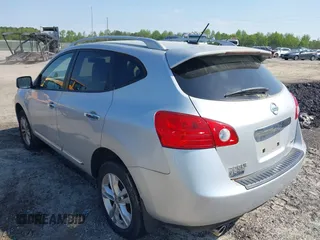 2013 Nissan Rogue S with VIN JN8AS5MV1DW645281, listed as a IAAI auction lot 42035789 with 124,423 mi miles and . Bid and sale history available at DreamBid. Image 3.