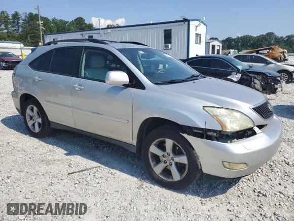 2006 Lexus RX 330 with VIN 2T2GA31U46C045659, listed as a Copart auction lot 60987985 with 122,714 mi miles and Salvage title. Bid and sale history available at DreamBid. Image 4.