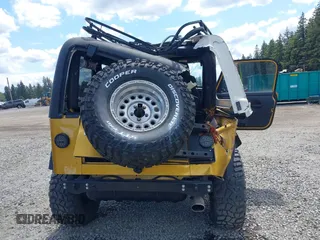 2003 Jeep Wrangler Rubicon with VIN 1J4FA69S93P302102, listed as a IAAI auction lot 42312951 with 146,408 mi miles and . Bid and sale history available at DreamBid. Image 16.