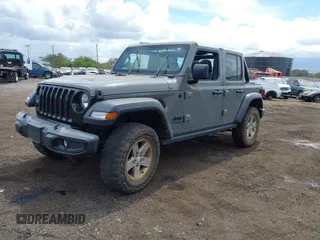 2021 Jeep Wrangler Unlimited Willys with VIN 1C4HJXDGXMW763324, listed as a IAAI auction lot 41643296 with 22,599 mi miles and . Bid and sale history available at DreamBid. Image 2.