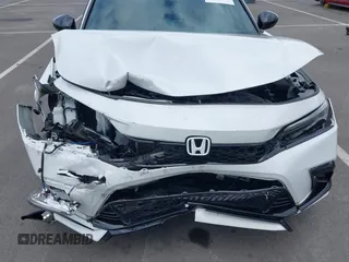 2023 Honda Civic Sport z VIN 2HGFE2F52PH551175, wystawiony jako IAAI lot #42251314 z przebiegiem 23 419 mil mil oraz . Historia ofert i sprzedaży dostępna na DreamBid. Obrazek 6.